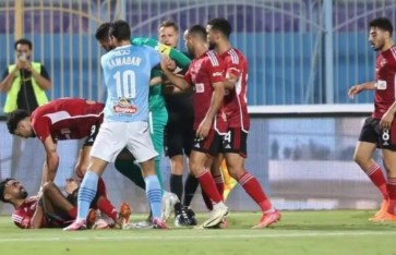 محمد الشيبي واللاعب مروان حمدي