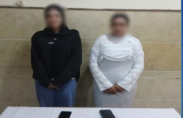 ضبط سيدتين بحوزتهما كروت دعائية انتخابية