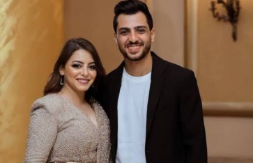 إلهام عبد البديع وزوجها 