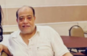 الفنان رضا إدريس ومحررة المصرى الآن الفنان رضا إدريس ومحررة المصرى الآن