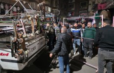 رفع إشغالات الباعة الجائلين بشارع العريش